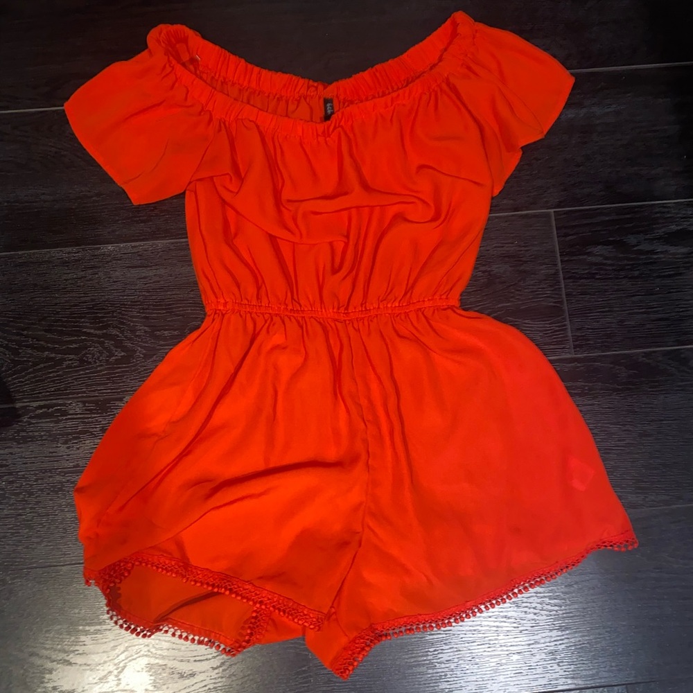 red romper with laced ends